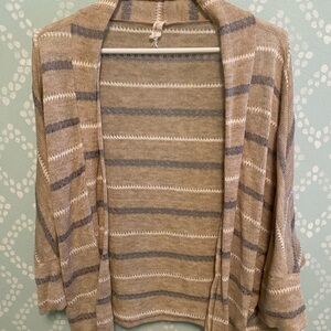 Neutral, open cardigan